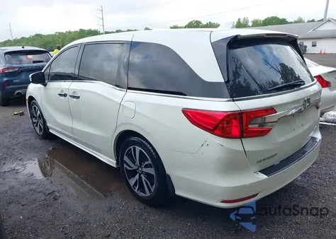 2018 Honda Odyssey Elite z USA, uszkodzony, nr VIN 5FNRL6H94JB008108